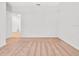 Carpeted bedroom leads to a hallway and an adjacent room at 437 Caribbean Ct, Kissimmee, FL 34759