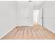 Carpeted bedroom features a closet and a doorway to another room at 437 Caribbean Ct, Kissimmee, FL 34759