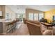 Bright, airy living space with modern furnishings and a seamless flow to the kitchen at 4444 Quartz Ct, Lakeland, FL 33811