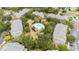 Community with lush landscaping, swimming pool, and ample parking surrounded by mature trees at 515 Rum Run # 33515, Davenport, FL 33897
