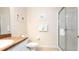 Bathroom with vanity, sink, toilet, tile floors, framed art, and a glass-enclosed shower at 515 Rum Run # 33515, Davenport, FL 33897