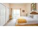 Bright bedroom featuring balcony access, complemented by warm neutral tones and comfortable furnishings at 515 Rum Run # 33515, Davenport, FL 33897
