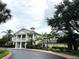 Elegant community clubhouse with manicured landscaping, offering a welcoming space for residents and events at 515 Rum Run # 33515, Davenport, FL 33897