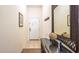 Entryway featuring a tiled floor, coat rack, and mirror at 515 Rum Run # 33515, Davenport, FL 33897