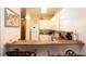 Bright kitchen with white cabinets and an eat-in bar at 515 Rum Run # 33515, Davenport, FL 33897