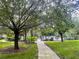 Beautiful pool with mature trees and landscaping; a great place to relax and enjoy the outdoors at 515 Rum Run # 33515, Davenport, FL 33897