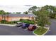 Exterior of restaurant with parking, professional landscaping, and covered entry at 515 Rum Run # 33515, Davenport, FL 33897