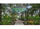 Charming splashpad entrance with colorful signage, inviting Gathering fun in a lush green setting at 515 Rum Run # 33515, Davenport, FL 33897