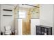 Bathroom showcasing a glass enclosed shower with a seat, dual shelving and toilet at 530 Lake Bingham Rd, Lake Mary, FL 32746