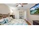 Bedroom featuring TV, mounted on the wall, and closet with shelving at 530 Lake Bingham Rd, Lake Mary, FL 32746