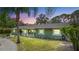 Charming single-story home with fresh green paint, landscaped yard, and welcoming porch at 530 Lake Bingham Rd, Lake Mary, FL 32746