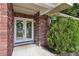 Inviting front entry features double glass doors and colorful flower arrangement at 5436 Tangerine Ave, Winter Park, FL 32792