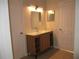Contemporary bathroom with modern vanity, ample lighting, and a clean, sleek design at 6021 Westgate Dr # 813, Orlando, FL 32835