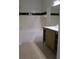 Clean bathroom featuring a tub with shower and a modern vanity with ample storage space at 6021 Westgate Dr # 813, Orlando, FL 32835