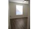 Spacious bedroom with hardwood floors, bright window, and a neutral palette for easy customization at 6021 Westgate Dr # 813, Orlando, FL 32835