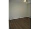 Comfortable bedroom with wood-look flooring, a ceiling fan, and ample natural light at 6021 Westgate Dr # 813, Orlando, FL 32835