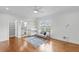 Bedroom featuring hardwood floors, a ceiling fan, and natural light at 6233 Rydal Ct, Windermere, FL 34786