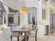 Sunny dining nook with view to the outdoor pool area at 6233 Rydal Ct, Windermere, FL 34786