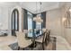 Formal dining room with modern chandelier and ornate front door at 6233 Rydal Ct, Windermere, FL 34786