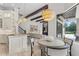 Bright and airy kitchen and breakfast nook with stainless appliances at 6233 Rydal Ct, Windermere, FL 34786