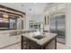 Chef's kitchen features a large island, stainless steel appliances, and backyard views at 6233 Rydal Ct, Windermere, FL 34786