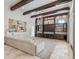 Expansive living room featuring a large sectional sofa, custom built-ins and stylish light fixture at 6233 Rydal Ct, Windermere, FL 34786