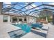 Backyard pool features a screened-in lanai and outdoor seating at 6233 Rydal Ct, Windermere, FL 34786