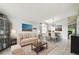 Bright living room featuring stylish furniture, tile flooring, and a charming decor at 7243 Minippi Dr, Orlando, FL 32818