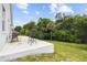 Patio seating with charcoal grill for barbecues and backyard views at 7243 Minippi Dr, Orlando, FL 32818