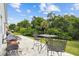 Patio seating and charcoal grills, perfect for outdoor cooking and enjoying the backyard at 7243 Minippi Dr, Orlando, FL 32818
