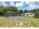 Large fenced backyard featuring a screened-in pool, offering privacy and leisure at 822 Glen Arden Way, Altamonte Springs, FL 32701