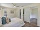 A bright bedroom offers a modern ceiling fan, an ensuite bathroom, and a walk-in closet at 822 Glen Arden Way, Altamonte Springs, FL 32701