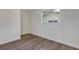 Empty bedroom featuring wood flooring, a window, and white walls at 822 Glen Arden Way, Altamonte Springs, FL 32701