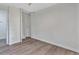 Bedroom features a built-in closet with ample storage and modern wood-look flooring at 822 Glen Arden Way, Altamonte Springs, FL 32701