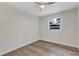 Empty bedroom showcasing wood flooring, a window, and white walls at 822 Glen Arden Way, Altamonte Springs, FL 32701