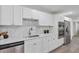 Bright kitchen featuring stainless appliances, white cabinets and quartz countertops at 822 Glen Arden Way, Altamonte Springs, FL 32701