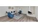 The cozy living room offers a chic vibe with modern furniture and vintage fireplace at 822 Glen Arden Way, Altamonte Springs, FL 32701