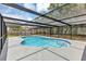 Backyard oasis featuring a screened-in pool, creating a tranquil retreat with ample sunlight at 822 Glen Arden Way, Altamonte Springs, FL 32701