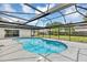 Inviting screened-in pool with clear blue water, perfect for relaxation and outdoor fun at 822 Glen Arden Way, Altamonte Springs, FL 32701