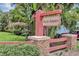 Glen Arden community sign with lush greenery, brick columns, and mature trees at 822 Glen Arden Way, Altamonte Springs, FL 32701
