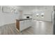 Kitchen island featuring a dark countertop and stylish wood design at 8812 Oakwood Dr, Lake Wales, FL 33898