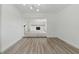 Open living area featuring sleek flooring and a neutral color scheme at 8812 Oakwood Dr, Lake Wales, FL 33898