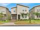 Charming two-story home featuring modern architecture, a two-car garage and front yard landscaping at 9239 Sommerset Hills Dr, Davenport, FL 33896
