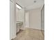 Bathroom with tile floors, a vanity, and a view into the toilet and shower area at 963 Beach Breeze Dr, Orlando, FL 32835