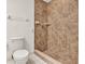 Modern bathroom with tiled shower, providing a sleek and functional space at 963 Beach Breeze Dr, Orlando, FL 32835