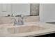 Close-up of a bathroom sink with faucet, showcasing a clean and modern design at 963 Beach Breeze Dr, Orlando, FL 32835