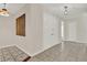Hallway features neutral walls, tile flooring, and recessed lighting at 963 Beach Breeze Dr, Orlando, FL 32835