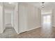 Hallway with closet, leading to a dining area and additional rooms at 963 Beach Breeze Dr, Orlando, FL 32835