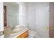 Cozy bathroom features a single sink, toilet, and mirror at 9948 Timber Oaks Ct # 14, Orlando, FL 32817