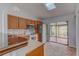 Functional kitchen featuring stainless steel appliances and an outside view at 9948 Timber Oaks Ct # 14, Orlando, FL 32817